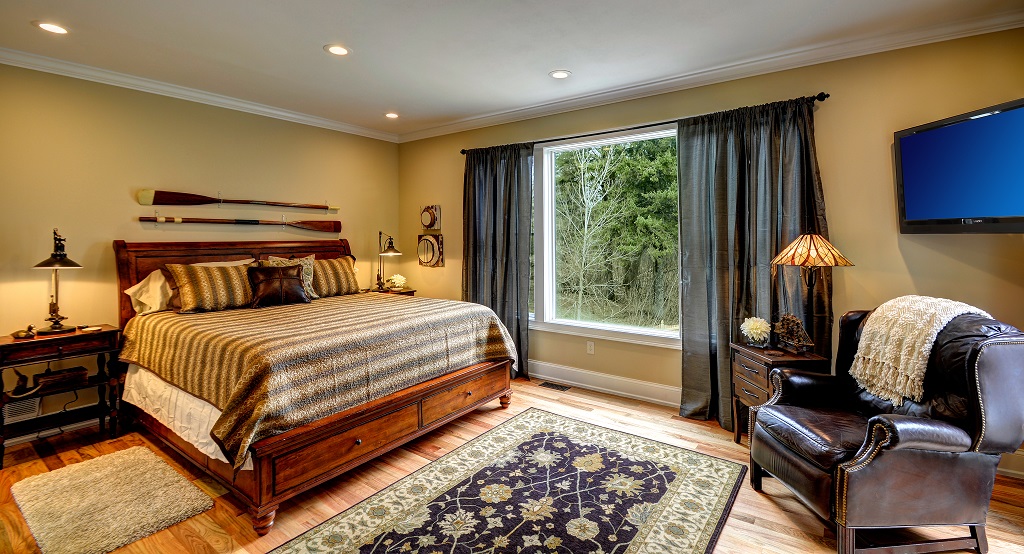 Understated elegance in our stately main level master bedroom suite